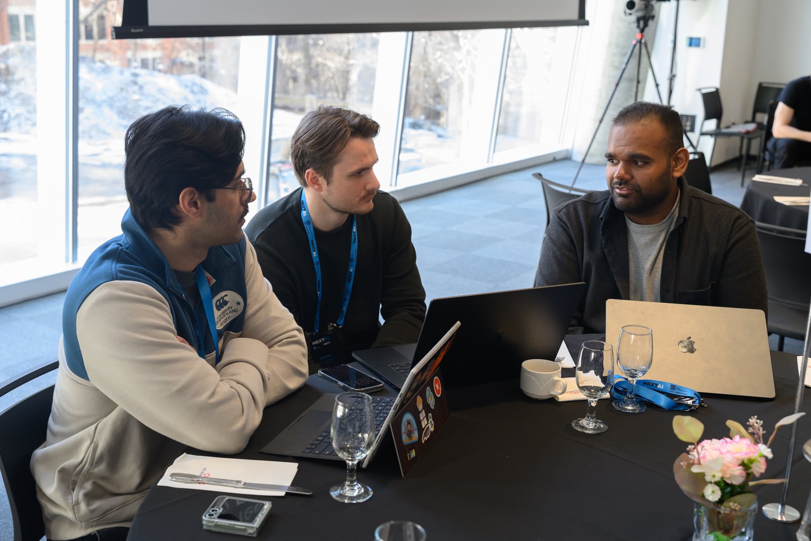 The Lumo team discussing product and go-to-market questions during Founder Days.